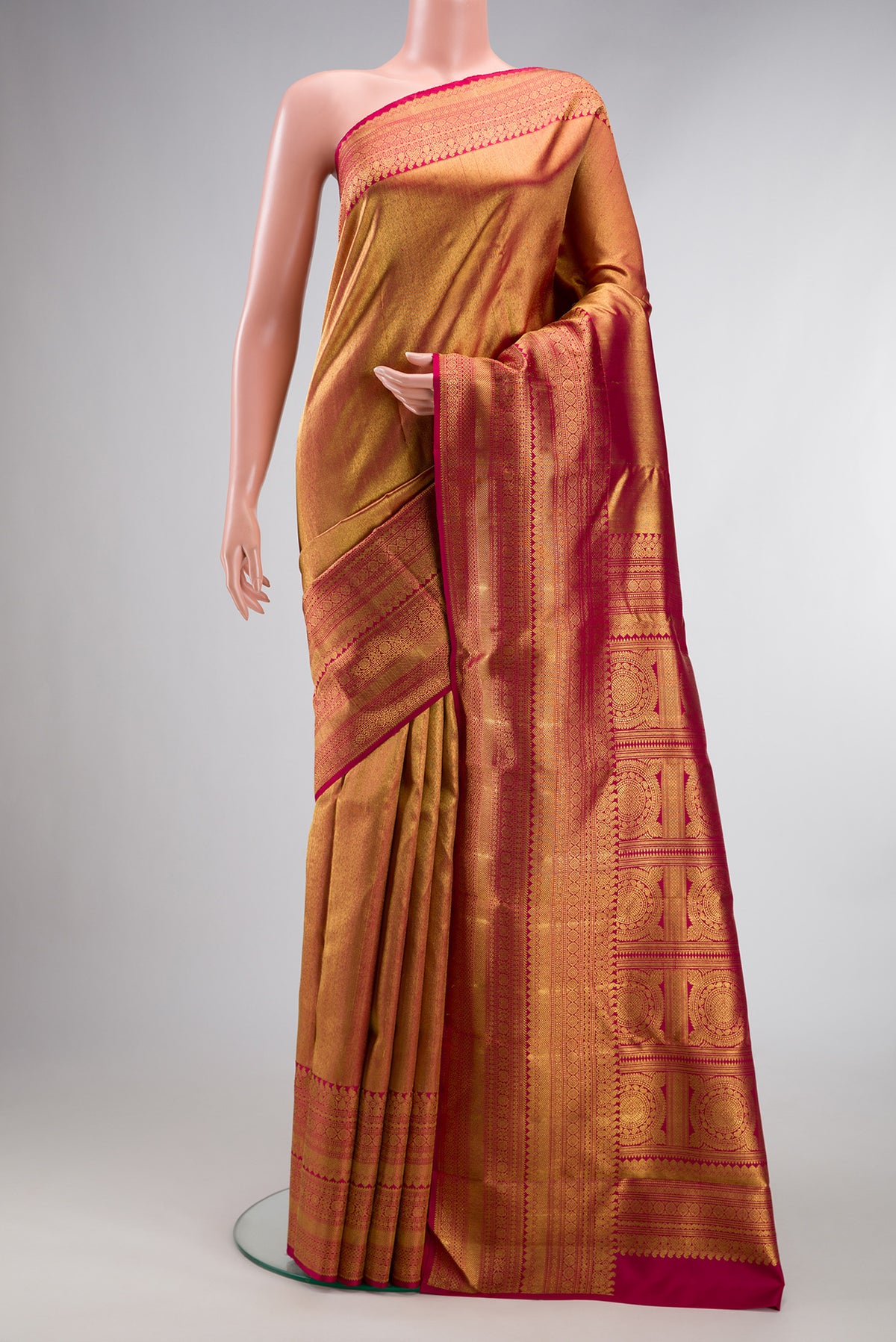 Pure Silk Pure Zari Dark Pink Dual Tone Kanjivaram Saree with Zari Brocade on the body and Zari Border.  displayed on a mannequin
