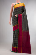 Pure Silk Coffee Brown Kanjivaram Saree with Jacquard design on the body and Ganga Jamuna Border.  displayed on a mannequin