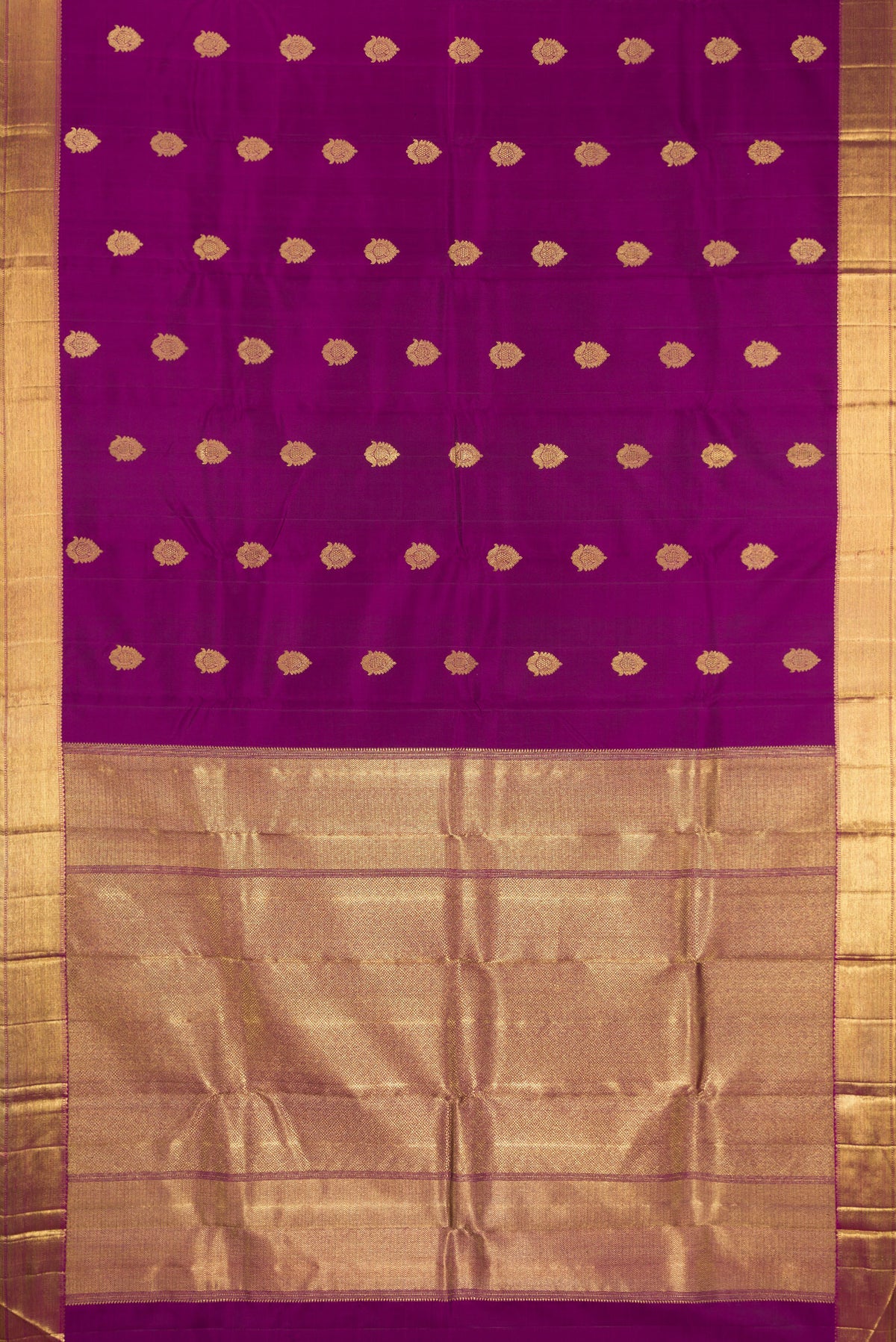 Flat view of Pure Silk Pure Zari Purple Kanjivaram Saree with Zari Butta on the body and Zari Border. 