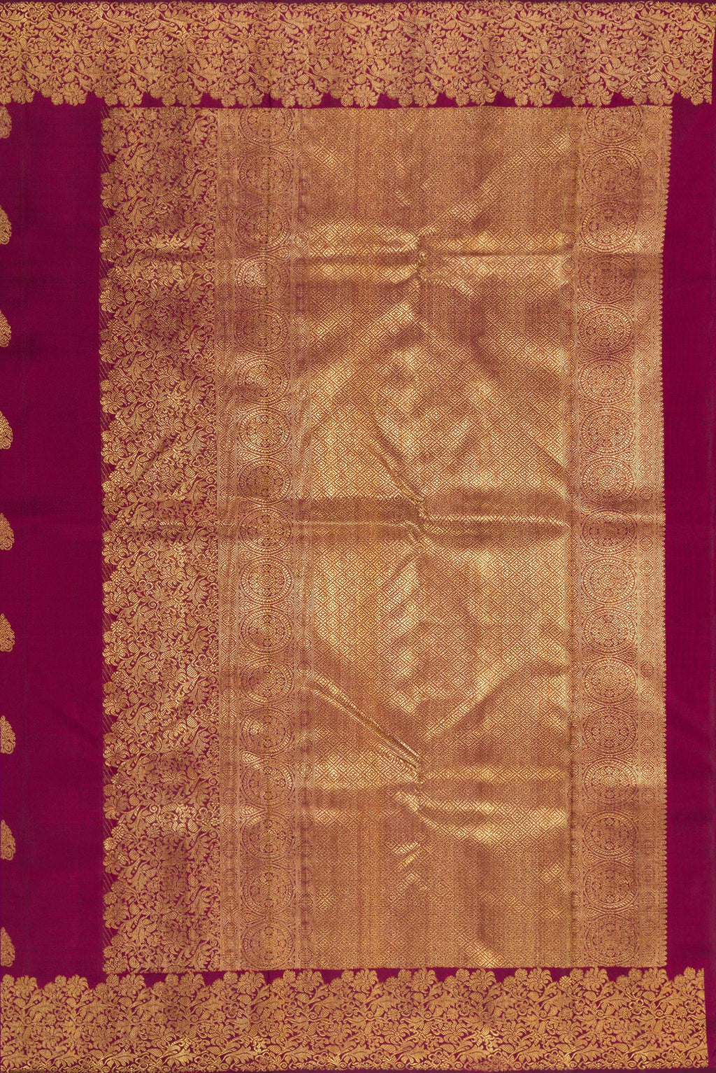 Close up image of the pallu of Pure Silk Pure Zari Maroon Kanjivaram Saree with Zari Butta on the body and Fancy Border. 