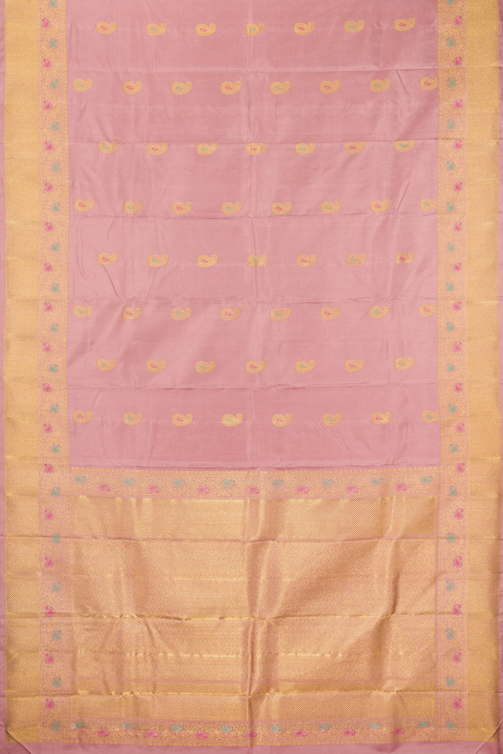 Flat view of Pure Silk Pure Zari Peach Kanjivaram Saree with Zari And Thread Butta on the body and Fancy Border. 
