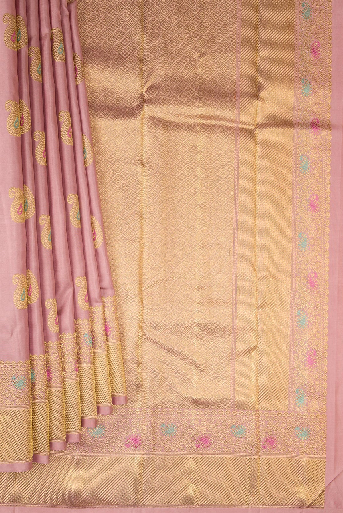 Pleats and pallu of Pure Silk Pure Zari Peach Kanjivaram Saree with Zari And Thread Butta on the body and Fancy Border. 
