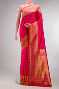 Pure Silk Pure Zari Dark Pink Kanjivaram Saree with Zari Butta on the body and Fancy Border.  displayed on a mannequin