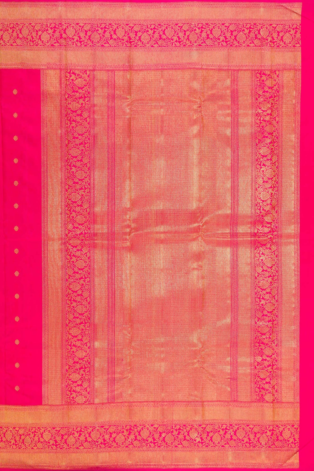 Close up image of the pallu of Pure Silk Pure Zari Dark Pink Kanjivaram Saree with Zari Butta on the body and Fancy Border. 