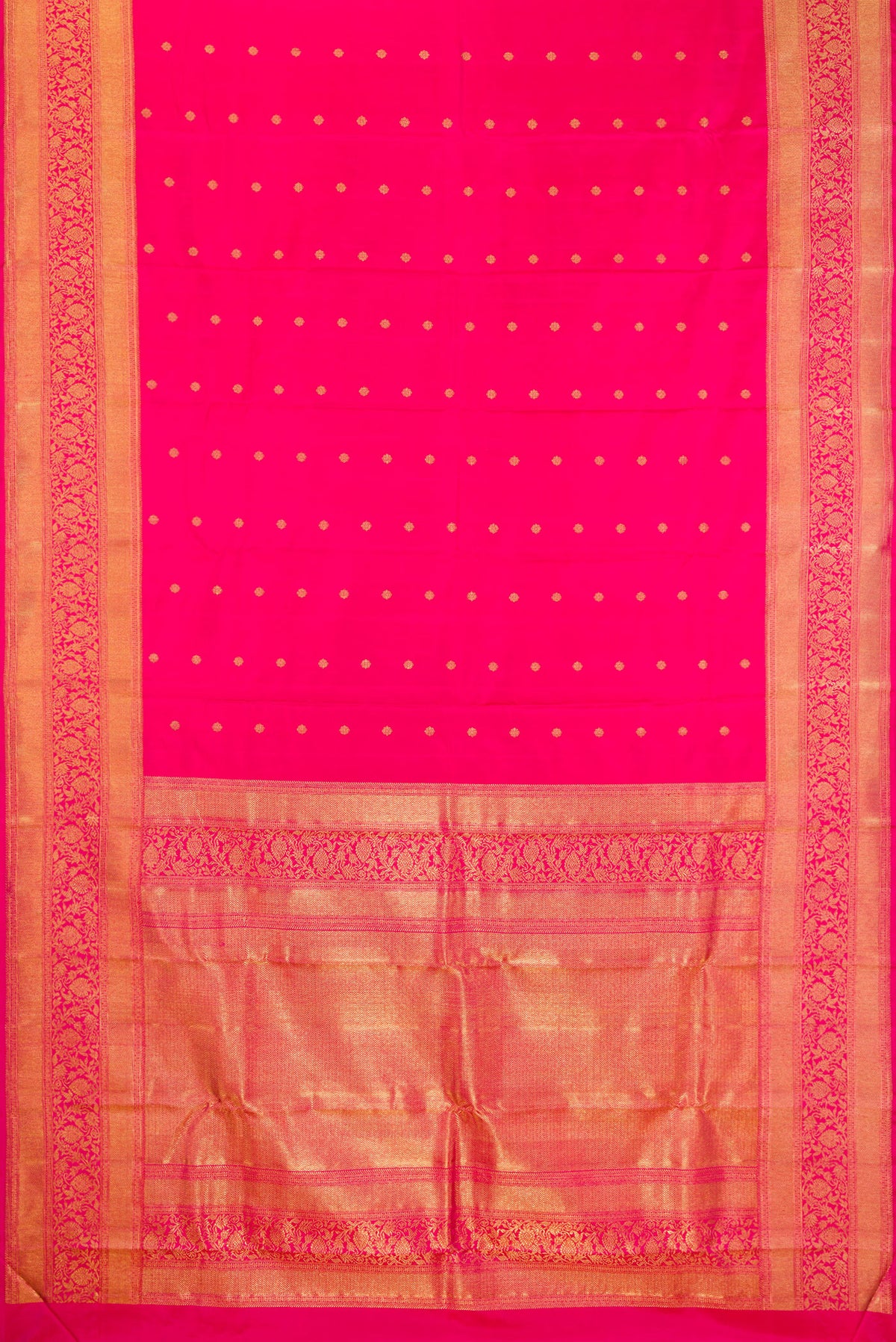 Flat view of Pure Silk Pure Zari Dark Pink Kanjivaram Saree with Zari Butta on the body and Fancy Border. 