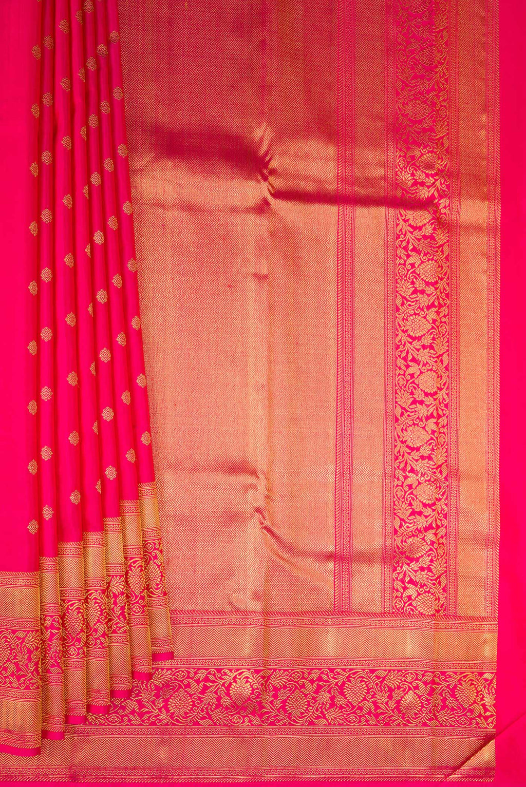 Pleats and pallu of Pure Silk Pure Zari Dark Pink Kanjivaram Saree with Zari Butta on the body and Fancy Border. 