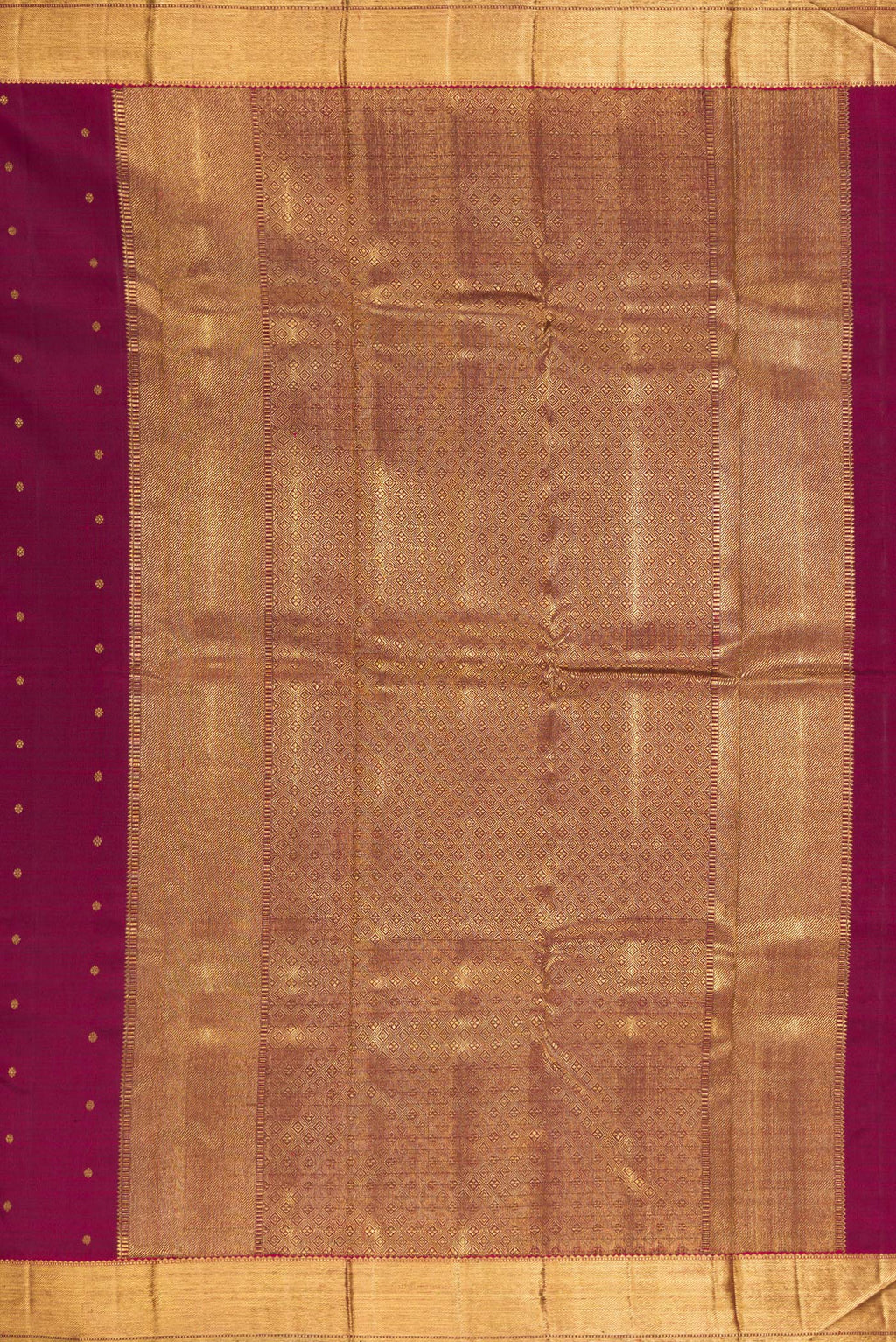 Close up image of the pallu of Pure Silk Pure Zari Maroon Kanjivaram Saree with Zari Butta on the body and Zari Border. 
