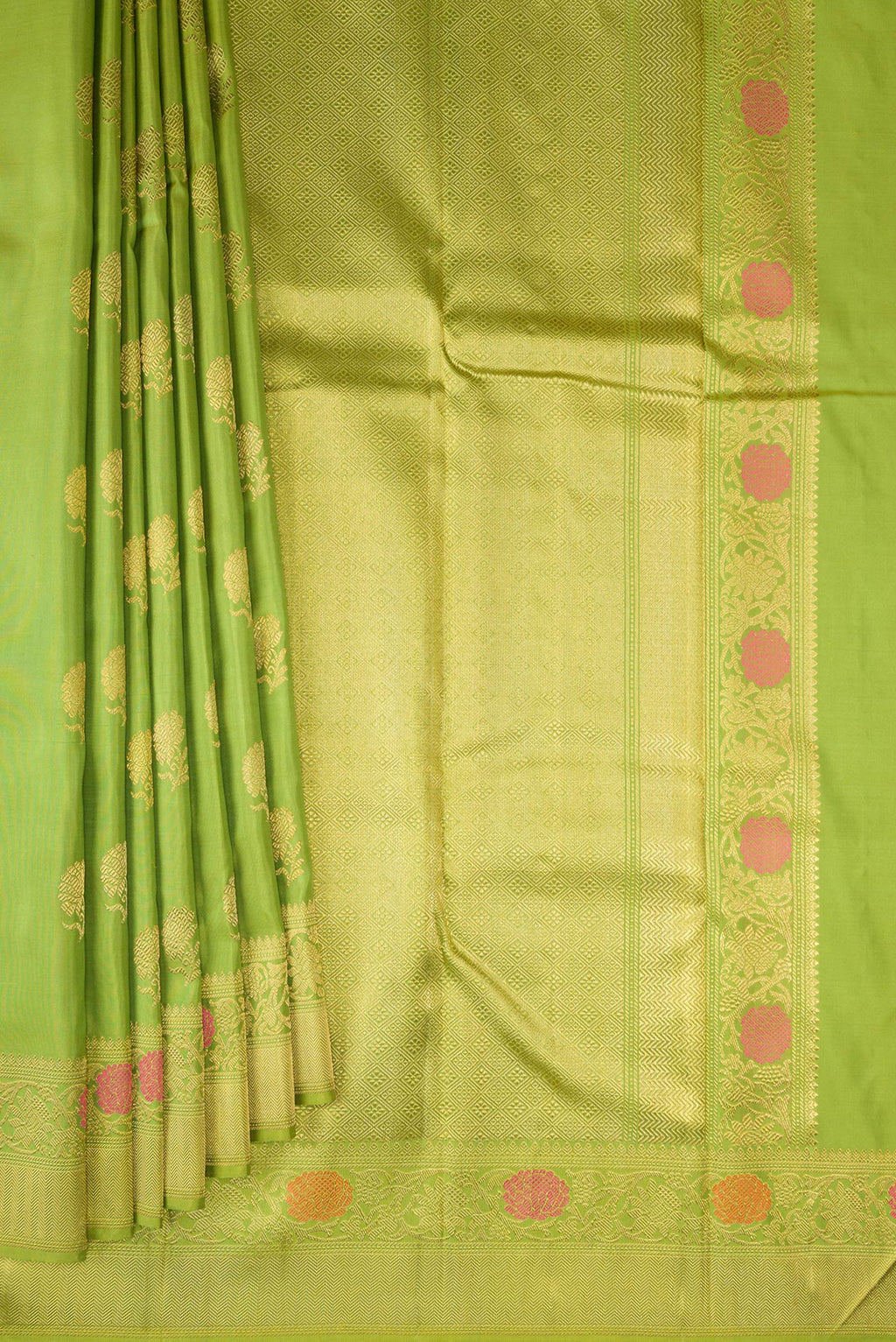 Pleats and pallu of Pure Silk Pure Zari Parrot Green Kanjivaram Saree with Zari And Thread Butta on the body and Fancy Border. 