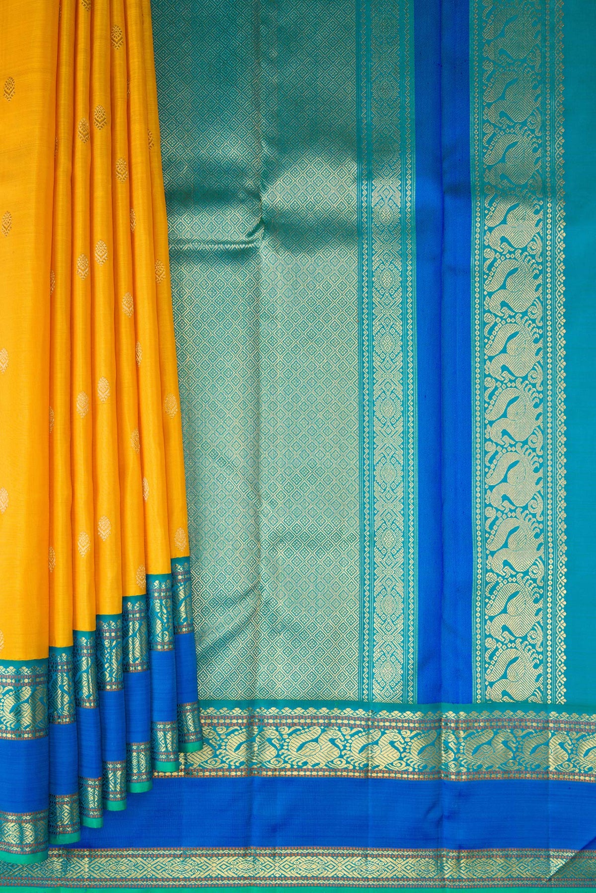 Pleats and pallu of Pure Silk Pure Zari Yellow Kanjivaram Saree with Zari Butta on the body and Zari Border. 