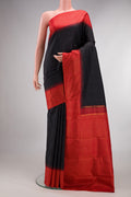 Pure Silk Pure Zari Black Kanchipuram Saree with Plain Body and Checks Border.  displayed on a mannequin