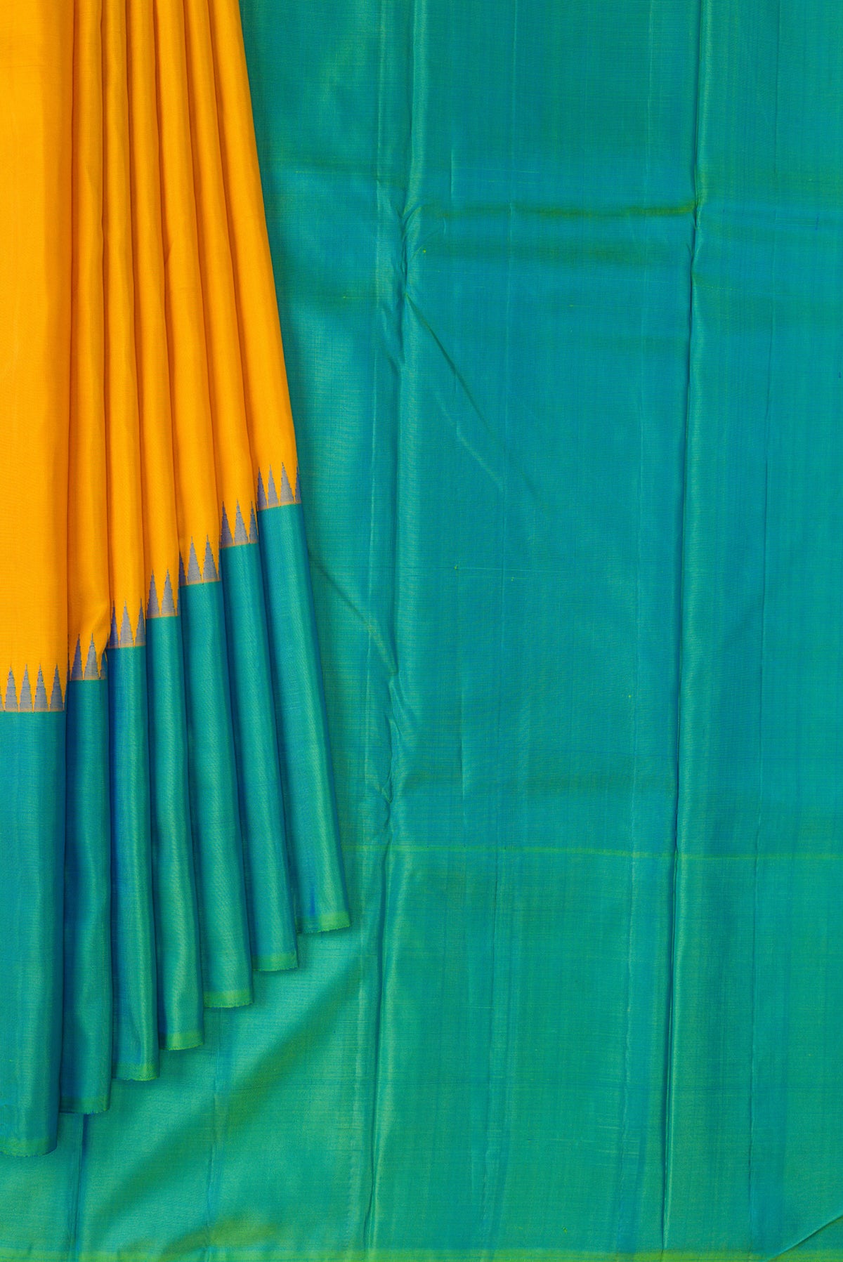 Pleats and pallu of Pure Silk Mustard Kanjivaram Saree with Plain Body and Temple Border. 