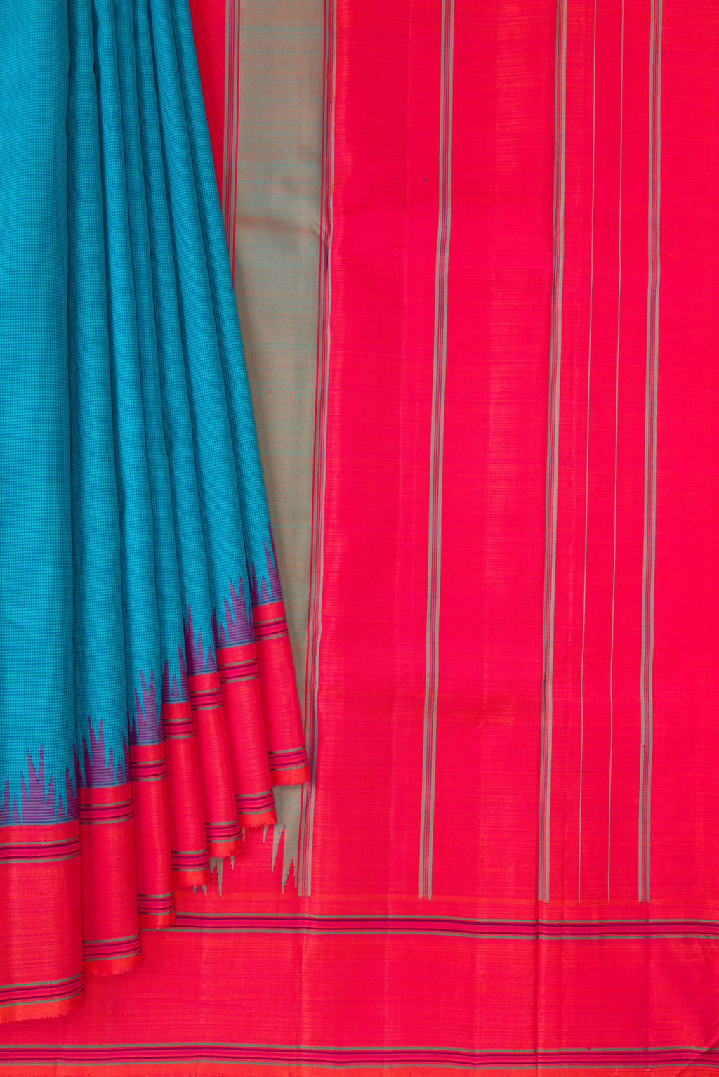 Pleats and pallu of Pure Silk Sky Blue Kanjivaram Saree with Checked design on the body and Thread Border. 