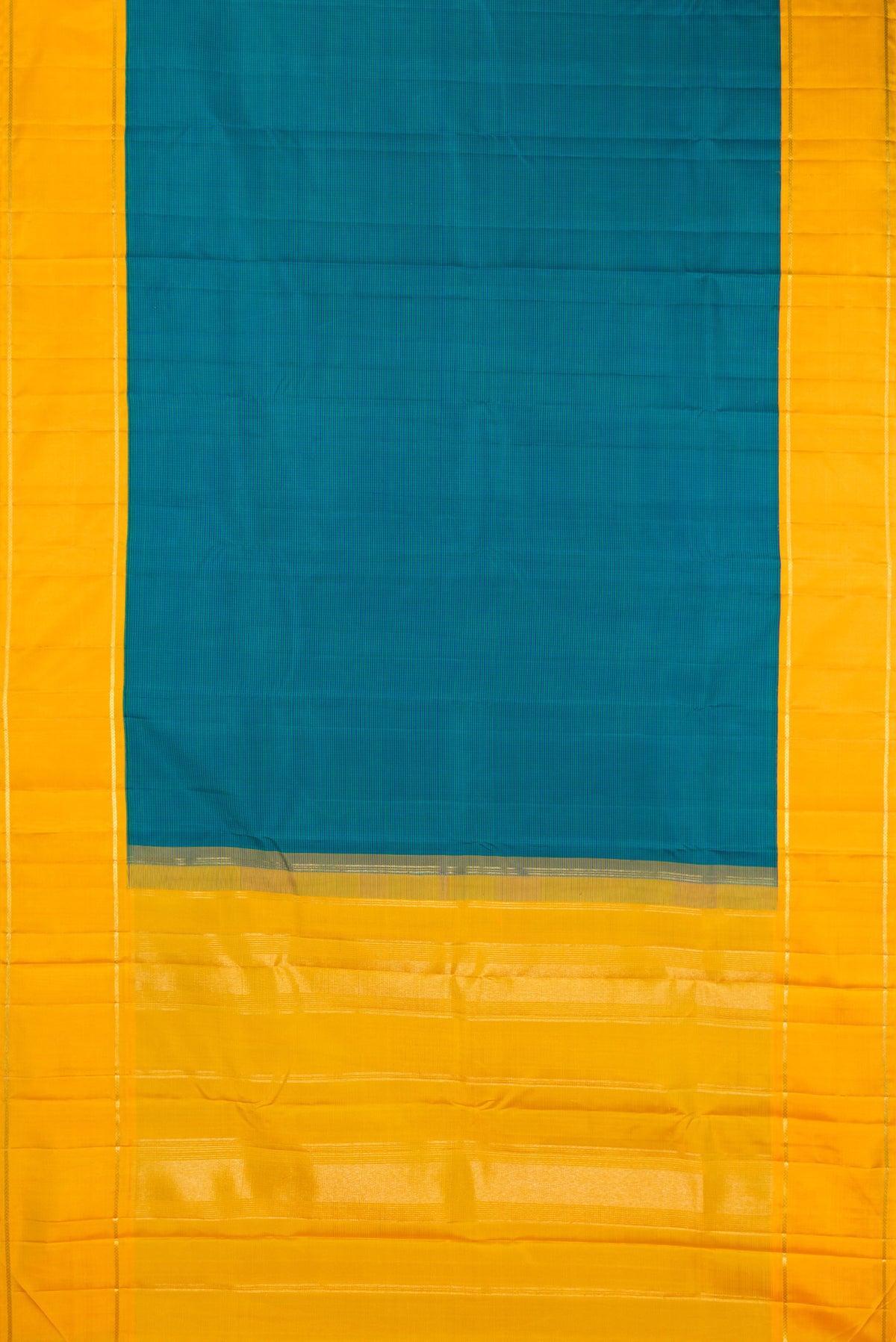 Flat view of Pure Silk Peacock Blue Dual Tone Kanjivaram Saree with Checked design on the body and Zari Border. 