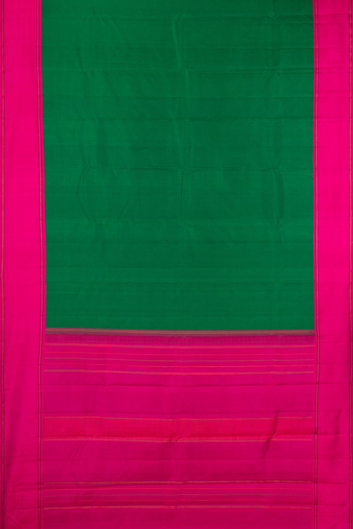Flat view of Pure Silk Green Kanjivaram Saree with Plain Body and Plain Border. 