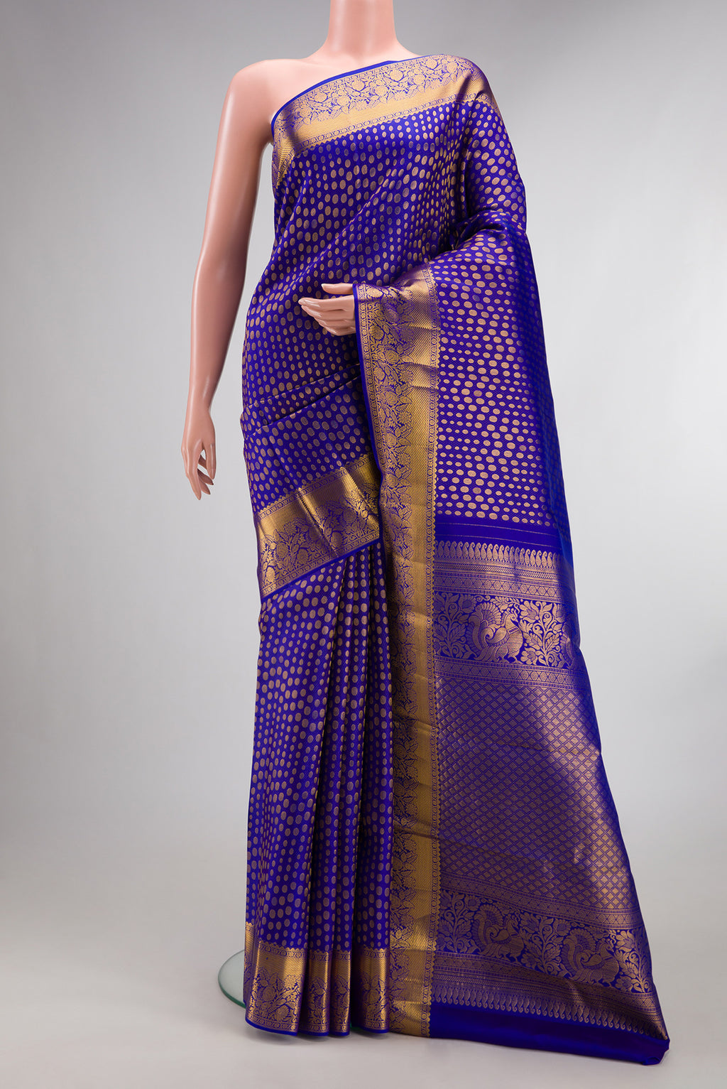 Pure Silk Royal Blue Dual Tone Kanjivaram Saree with Zari Brocade on the body and Zari Border.  displayed on a mannequin