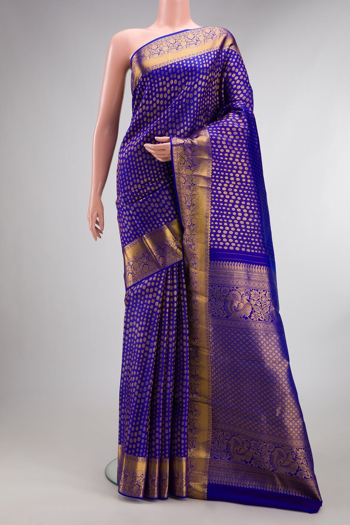 Pure Silk Royal Blue Dual Tone Kanjivaram Saree with Zari Brocade on the body and Zari Border.  displayed on a mannequin