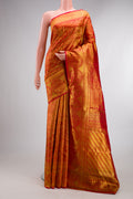 Pure Silk Red Kanchipuram Saree with Zari Brocade on the body and Fancy Border.  displayed on a mannequin