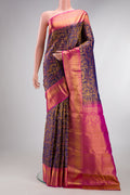 Pure Silk Purple Dual Tone Kanchipuram Tissue Saree with Zari Brocade on the body and Zari Border.  displayed on a mannequin