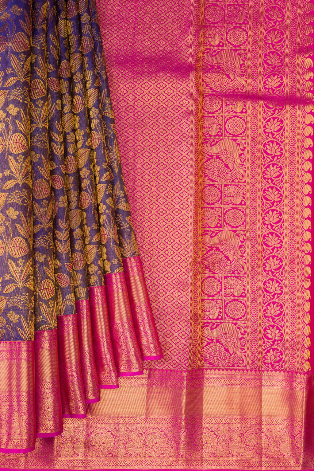 Pleats and pallu of Pure Silk Purple Dual Tone Kanchipuram Tissue Saree with Zari Brocade on the body and Zari Border. 