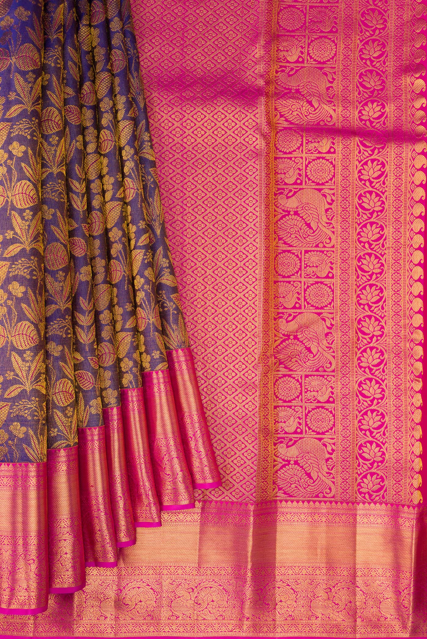 Pleats and pallu of Pure Silk Purple Dual Tone Kanchipuram Tissue Saree with Zari Brocade on the body and Zari Border. 