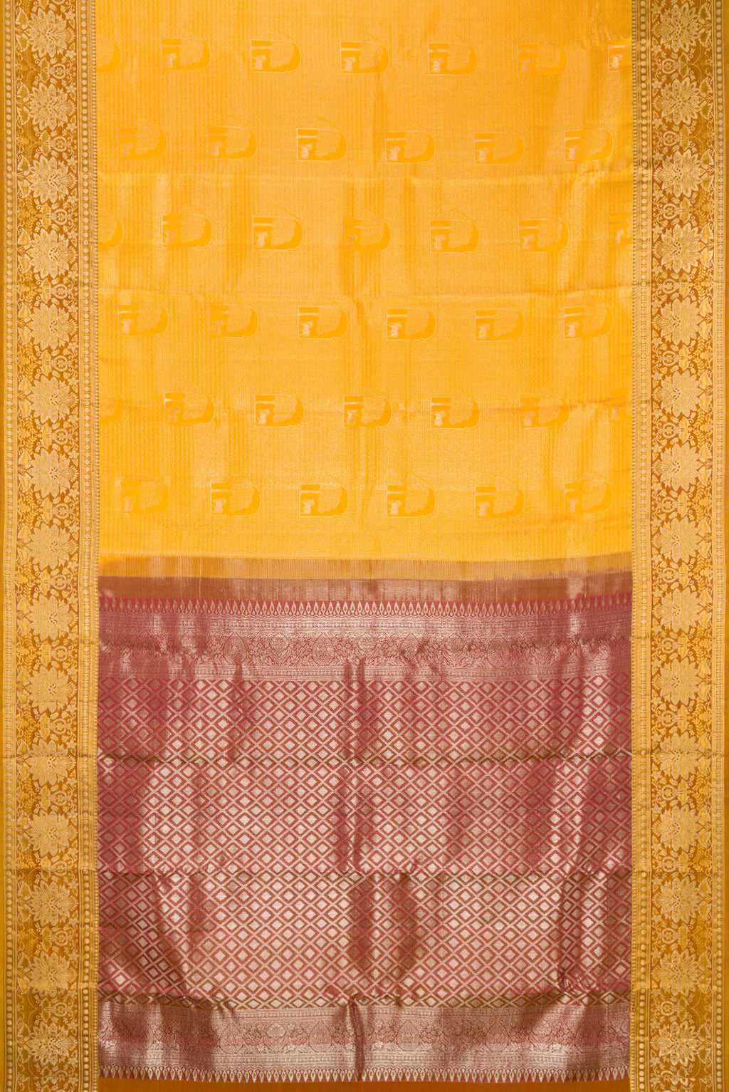 Flat view of Yellow Kanchipuram Tissue Saree with Zari Brocade on the body and Fancy Border. 