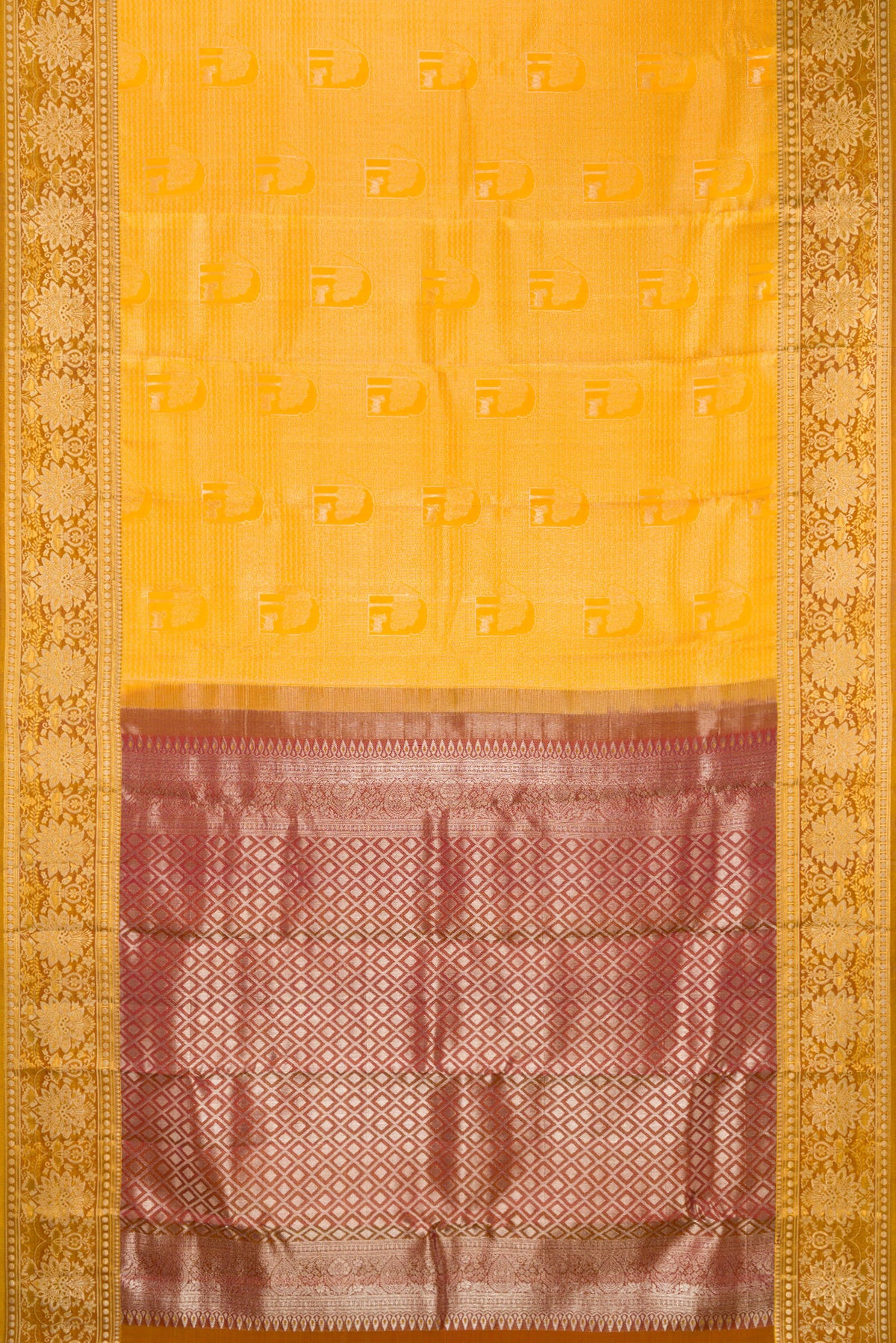 Flat view of Yellow Kanchipuram Tissue Saree with Zari Brocade on the body and Fancy Border. 