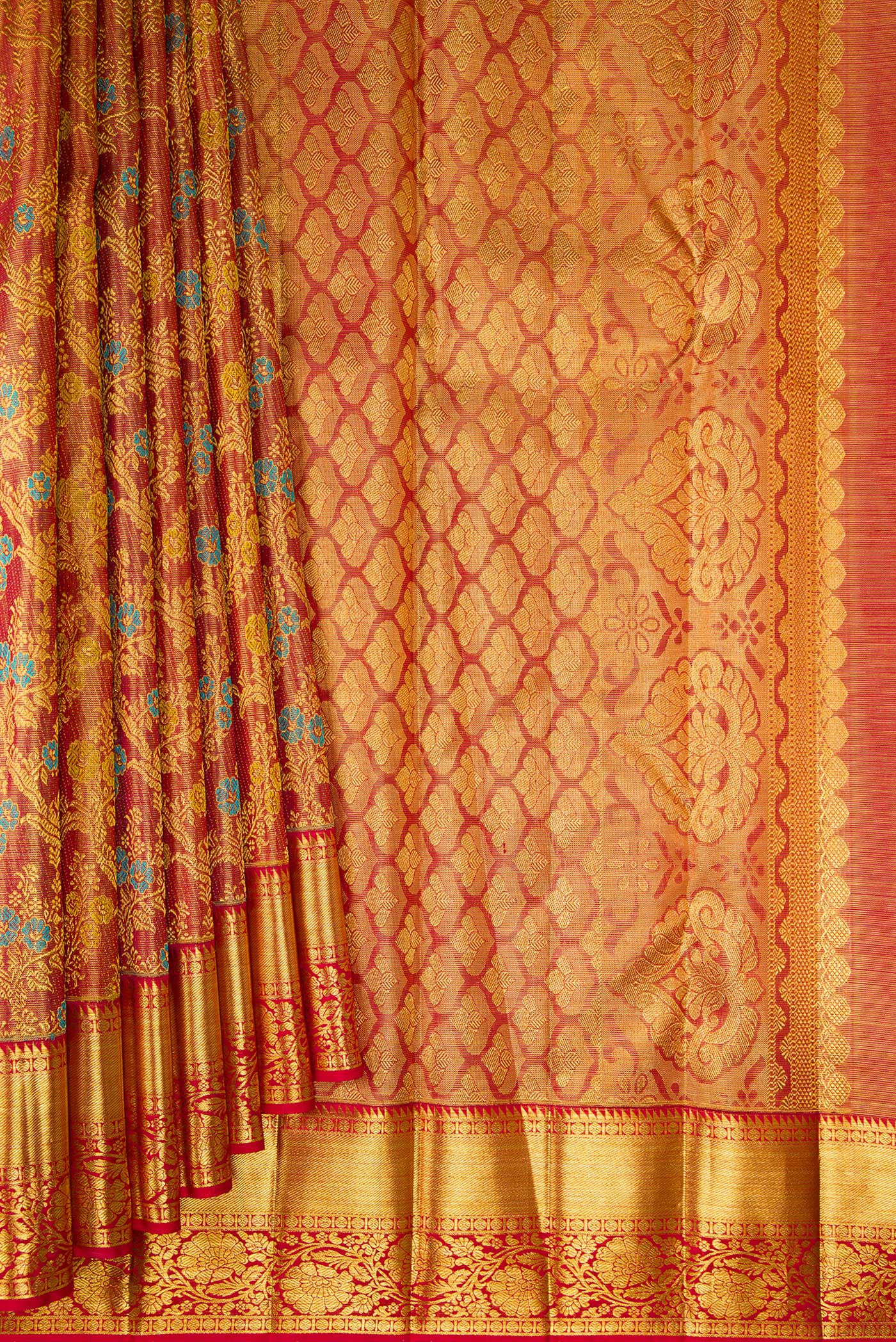 Pleats and pallu of Pure Silk Maroon Dual Tone Kanjivaram Tissue Saree with Zari Brocade on the body and Zari Border. 