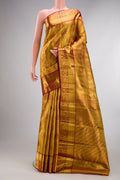 Gold Dual Tone Kanchipuram Tissue Saree with Zari Brocade on the body and Zari Border.  displayed on a mannequin