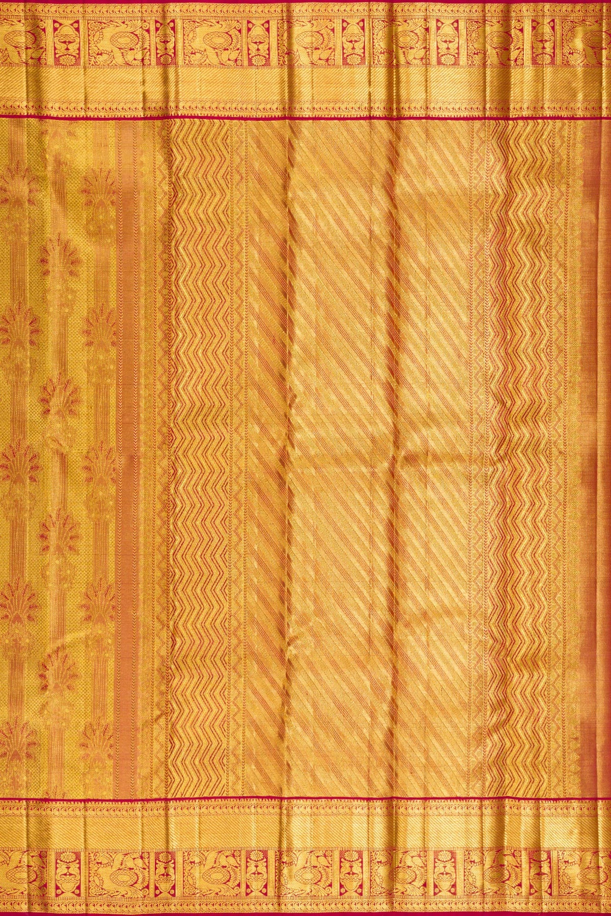 Close up image of the pallu of Gold Dual Tone Kanchipuram Tissue Saree with Zari Brocade on the body and Zari Border. 