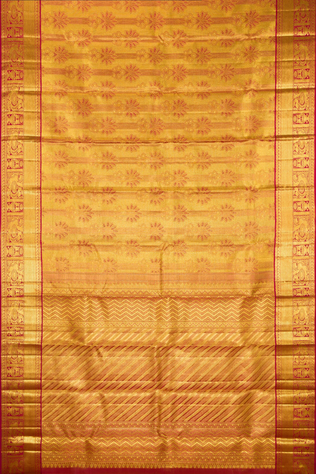 Flat view of Gold Dual Tone Kanchipuram Tissue Saree with Zari Brocade on the body and Zari Border. 