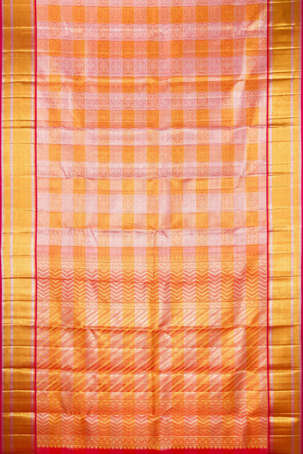 Flat view of Multi Color Kanchipuram Tissue Saree with Zari Brocade on the body and Zari Border. 