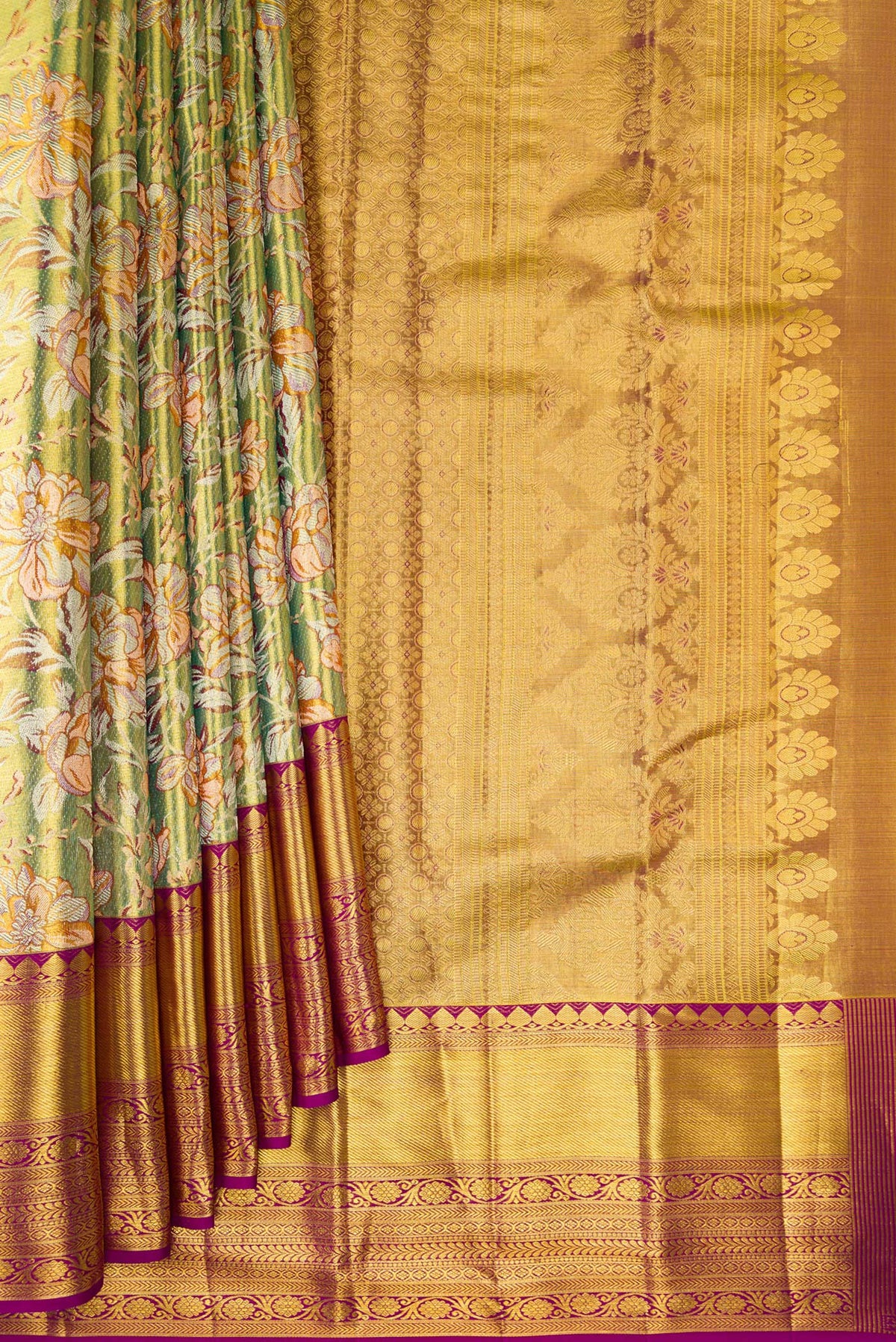 Pleats and pallu of Pure Silk Pista Green Dual Tone Kanchipuram Tissue Saree with Zari Brocade on the body and Zari Border. 