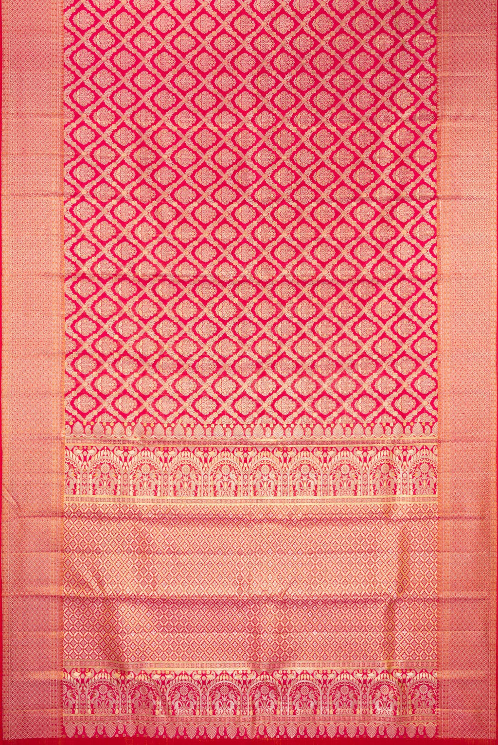 Flat view of Dark Pink Dual Tone Kanchipuram Tissue Saree with Zari Brocade on the body and Fancy Border. 