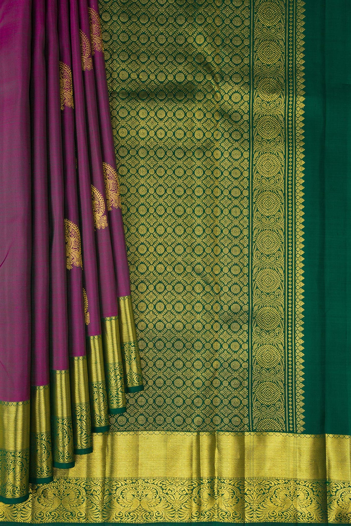 Pleats and pallu of Pure Silk Purple Kanjivaram Saree with Zari Butta on the body and Zari Border. 