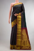 Pure Silk Bottle Green with Maroon Color Kanjivaram Saree with Zari Butta on the body and Zari Border.  displayed on a mannequin