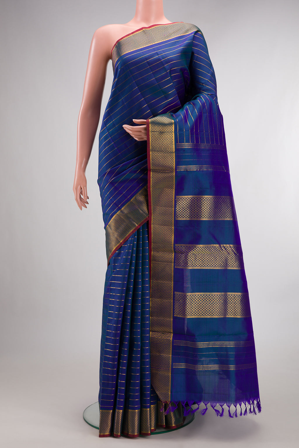 Pure Silk Peacock Blue Dual Tone Kanjivaram Nine Yards Saree with Veldhari on the body and Zari Border.  displayed on a mannequin