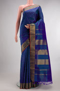 Pure Silk Peacock Blue Dual Tone Kanjivaram Nine Yards Saree with Veldhari on the body and Zari Border.  displayed on a mannequin