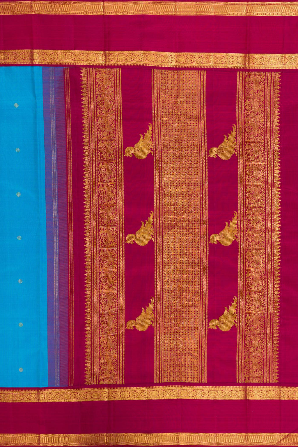 Close up image of the pallu of Pure Silk Sky Blue Kanjivaram Saree with Zari Butta on the body and Zari Border. 