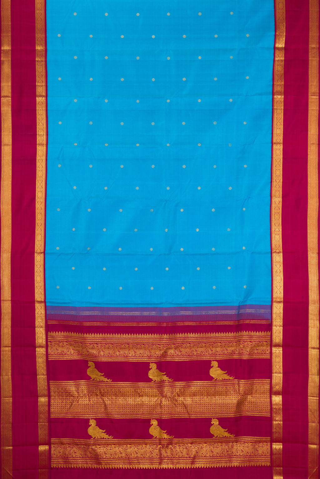 Flat view of Pure Silk Sky Blue Kanjivaram Saree with Zari Butta on the body and Zari Border. 