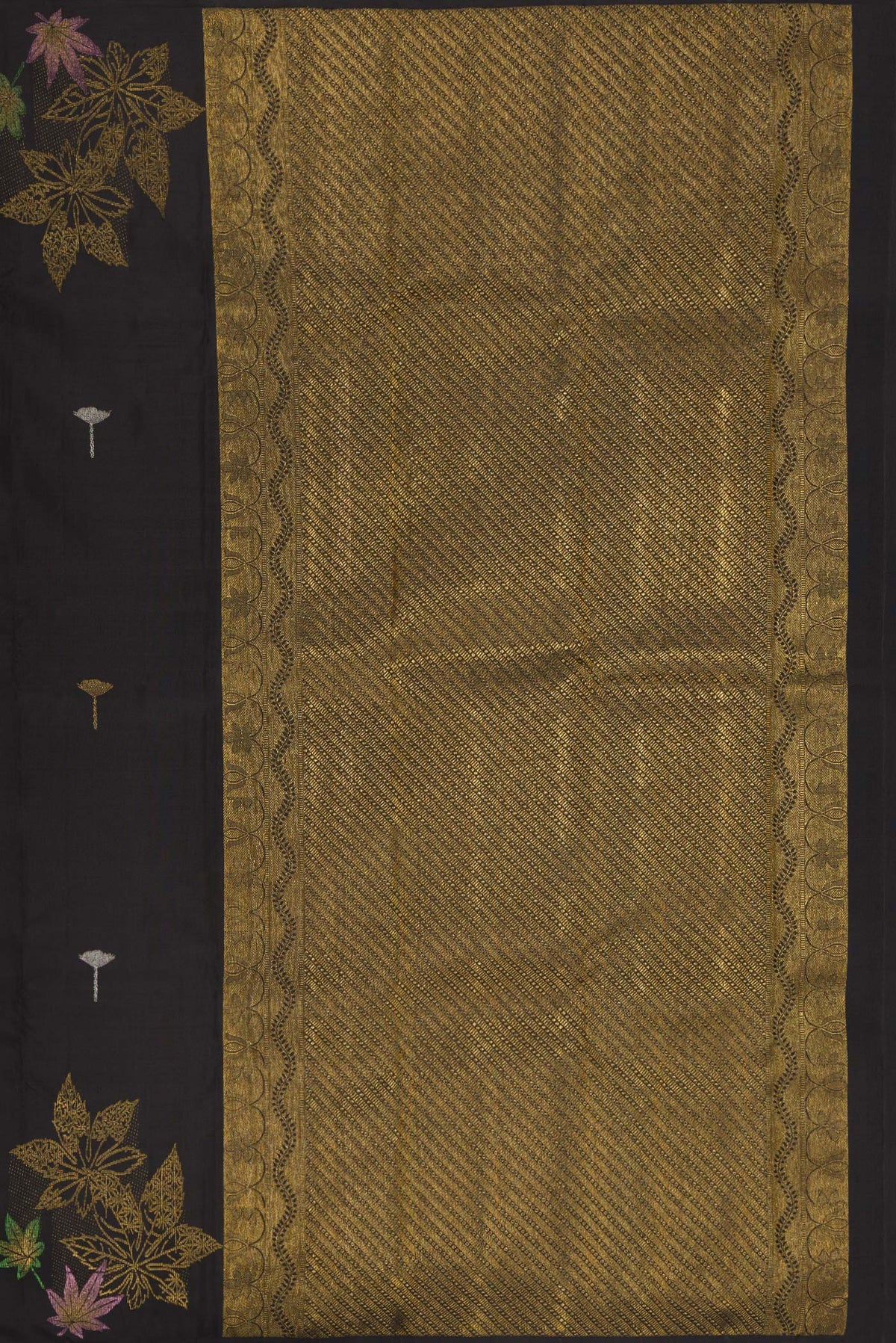 Close up image of the pallu of Pure Silk Black Kanchipuram Saree with Zari Butta on the body and Without Border. 