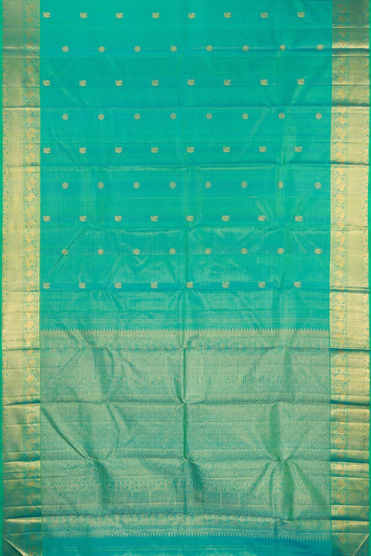 Flat view of Pure Silk Turquoise Kanjivaram Saree with Zari Butta on the body and Zari Border. 
