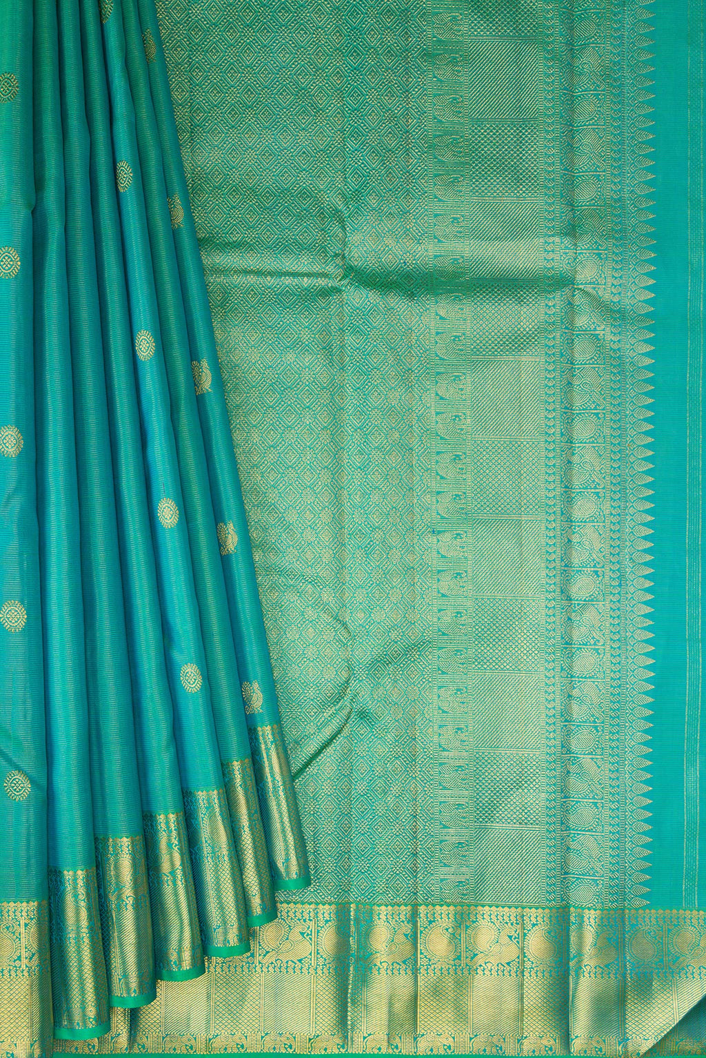 Pleats and pallu of Pure Silk Turquoise Kanjivaram Saree with Zari Butta on the body and Zari Border. 