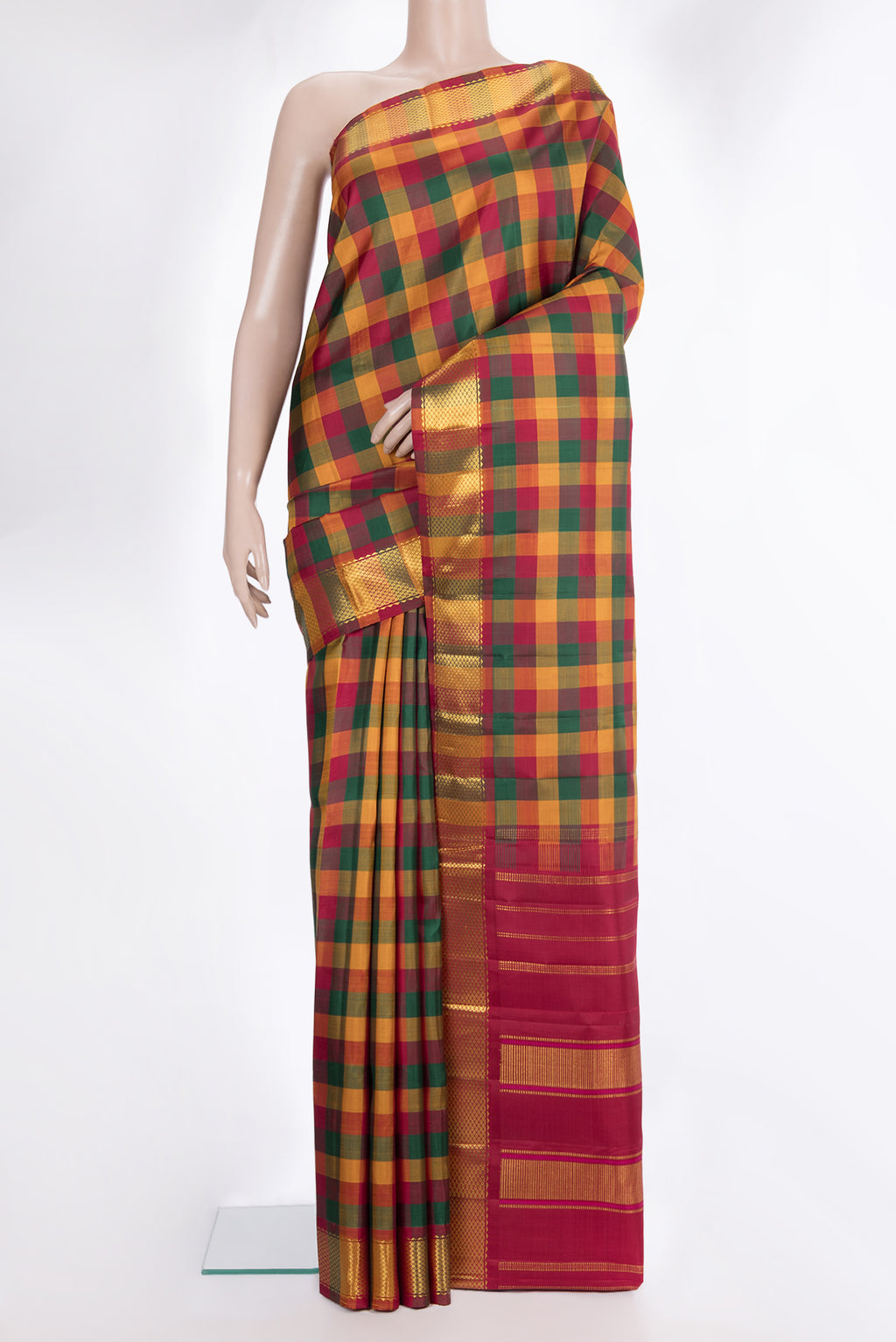 Pure Silk Multi Color Kanchipuram Saree with Checked design on the body and Zari Border.  displayed on a mannequin