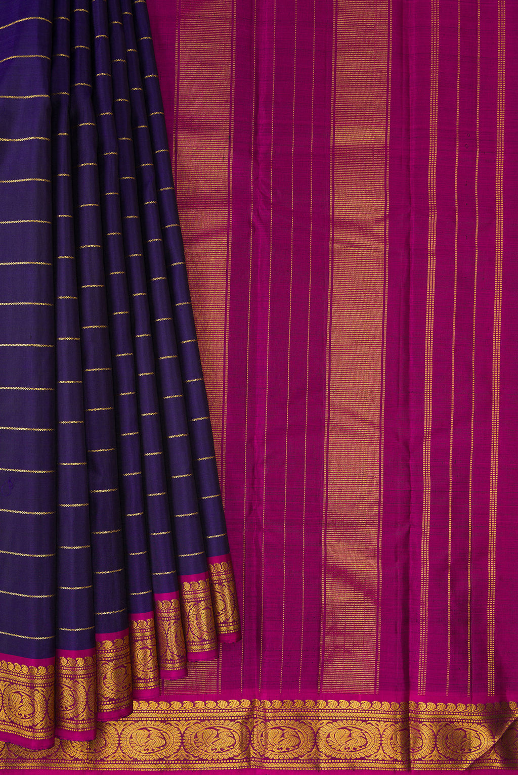 Pleats and pallu of Pure Silk Navy Blue Kanchipuram Saree with Veldhari on the body and Zari Border. 