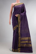Pure Silk Navy Blue Kanchipuram Saree with Checked design on the body and Zari Border.  displayed on a mannequin