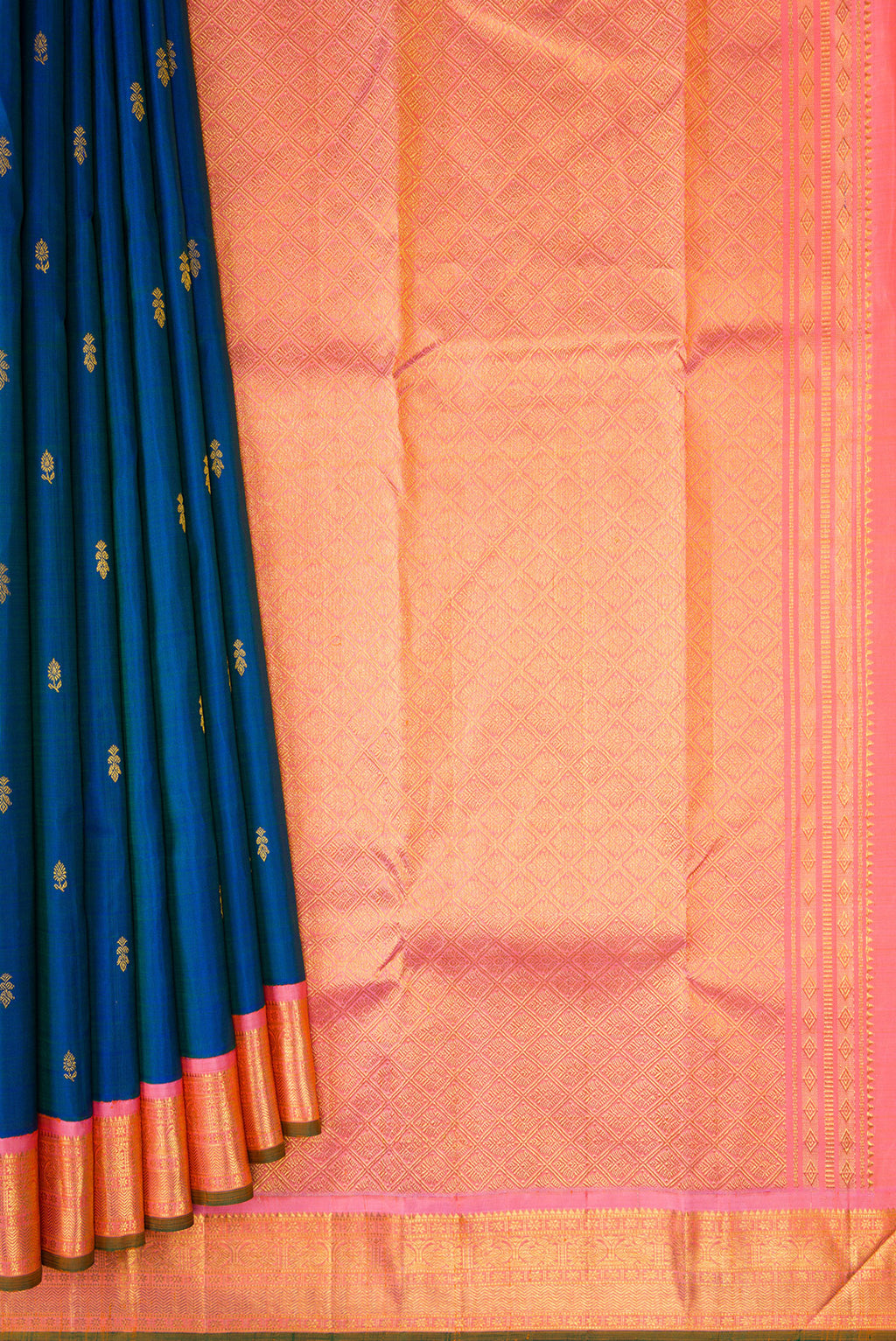 Pleats and pallu of Pure Silk Peacock Blue Dual Tone Kanjivaram Saree with Zari Butta on the body and Zari Border. 