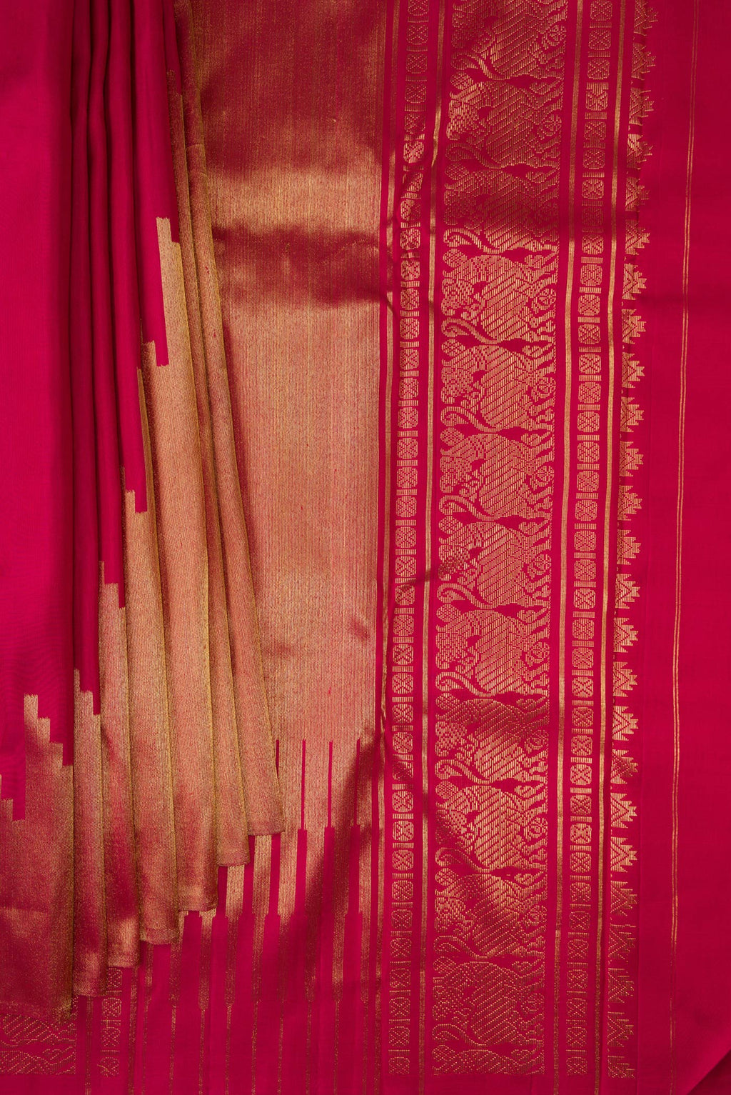Pleats and pallu of Pure Silk Pure Zari Maroon Kanjivaram Saree with Plain Body and Rising Temple Border. 
