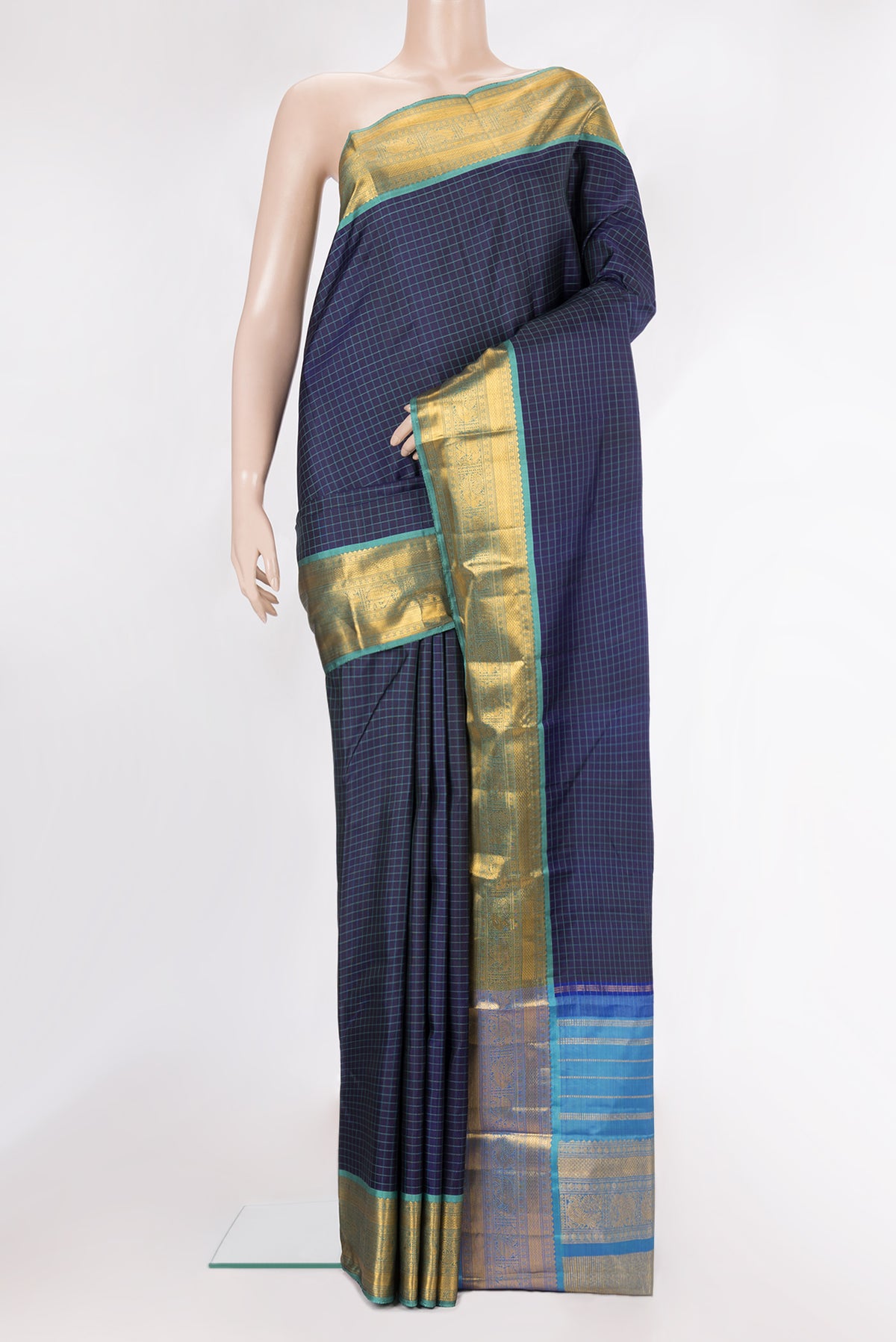 Pure Silk Navy Blue Dual Tone Kanjivaram Saree with Checked design on the body and Zari Border.  displayed on a mannequin
