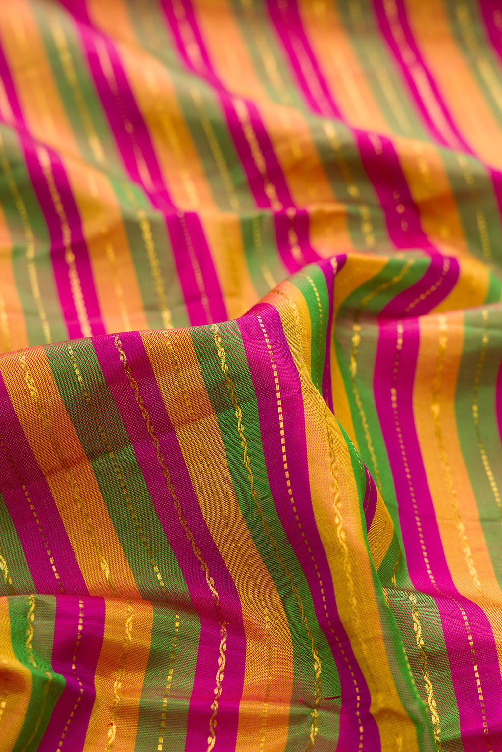 Close up of Pure Silk Multi Color Kanjivaram Nine Yards Saree with Stripes on the body and Zari Border.  displaying folds