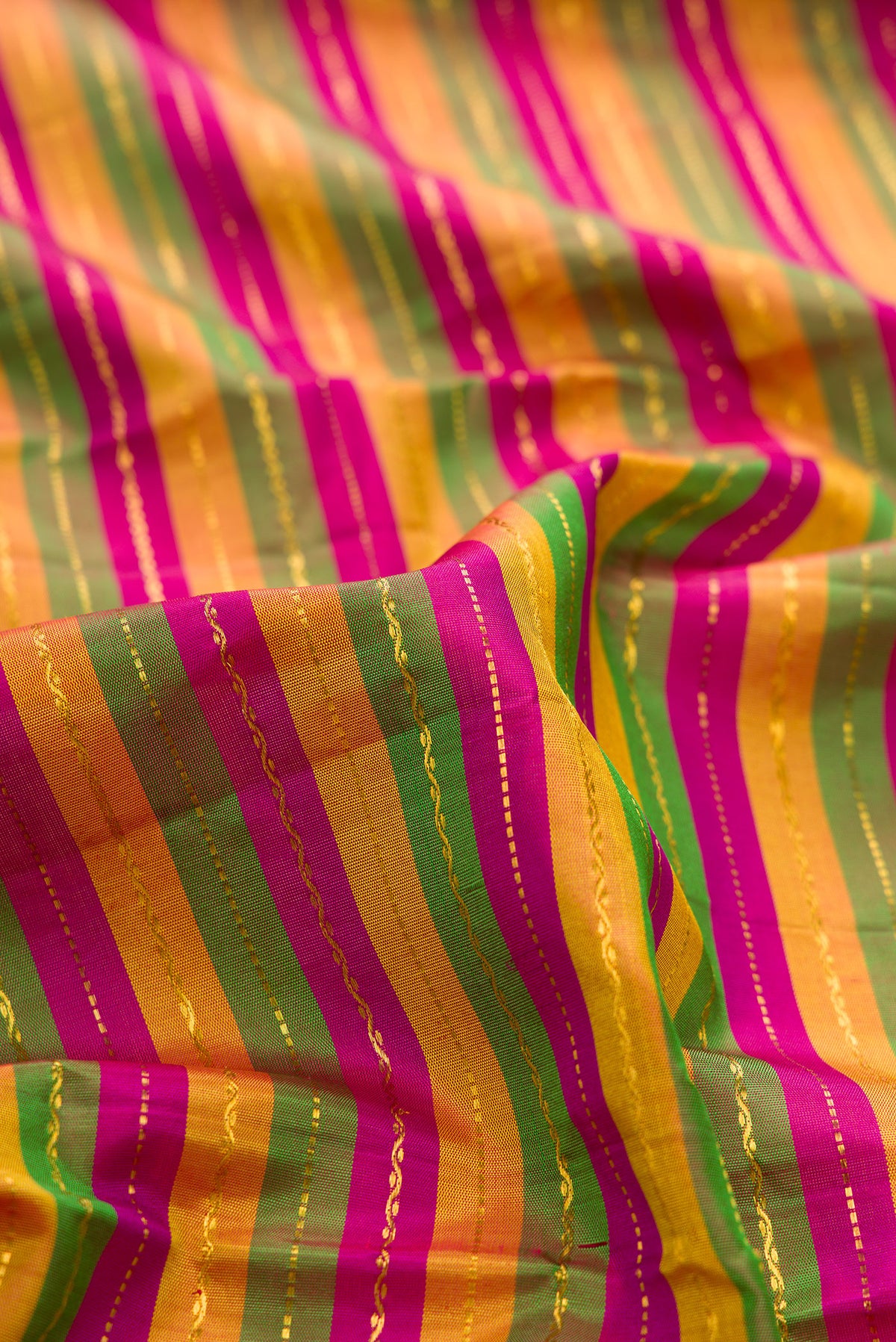 Close up of Pure Silk Multi Color Kanjivaram Nine Yards Saree with Stripes on the body and Zari Border.  displaying folds